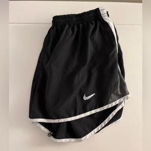 Women’s size large, black Nike shorts